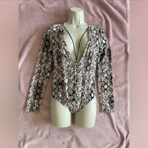 Victoria’s Secret bodysuit. Size M. New